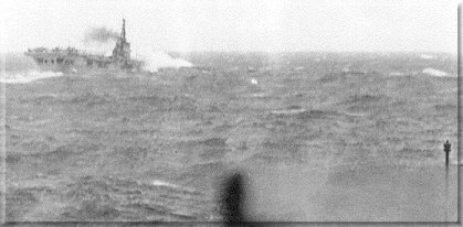 HMS Theseus imitating a whale. c 1949 - Taken from the bridge of Euryalus in the short but fierce Mediterranean storm that ruined my camera!
