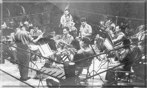 Nazzer' Bone and Forth band prior to the hurricane in Tripoli Harbour. L-r. 'Knocker' Paine, 'Whacker' Paine, Ted Stigwood, Ron DeLorey, (in front of)' Taff' Lewis, (in front of) 'Tubby' Williams, Ray Woodfield,  self, 'Rattler' Morgan, Headley Paxton, Jimmy Dowling, 'Taff' Evans, Alf Alltimes, Ian Quarterly.